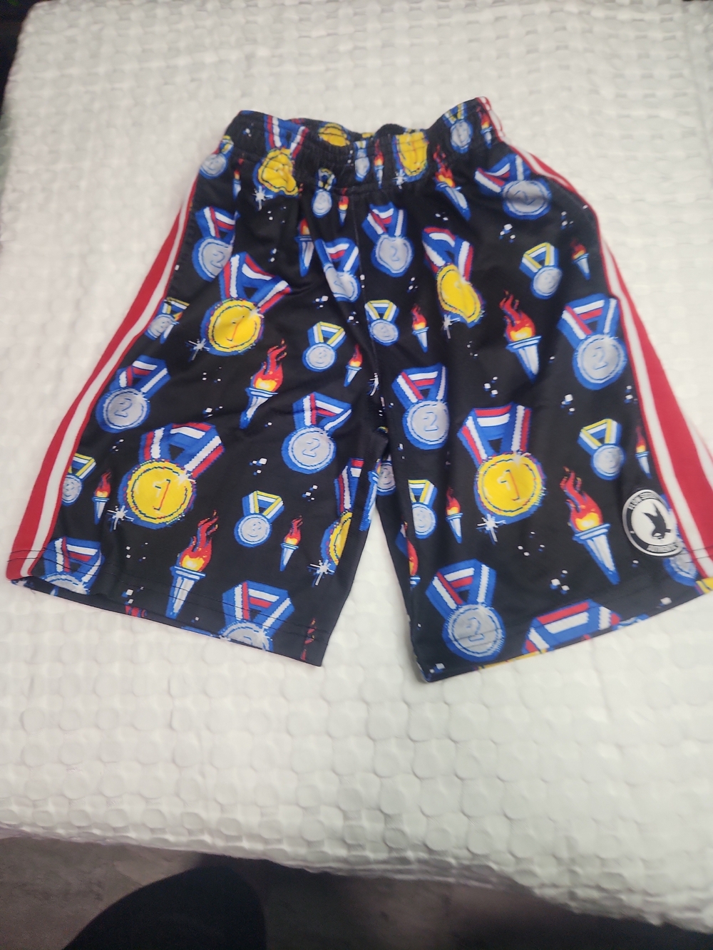 Kids Black Athletic Shorts with Medal Print and Red Stripes
